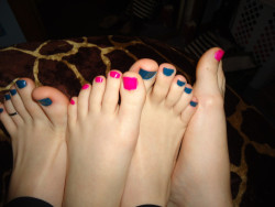 Such pretty painted toenails on these two princesses