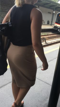Sexy blonde with pantylines showing through skirt