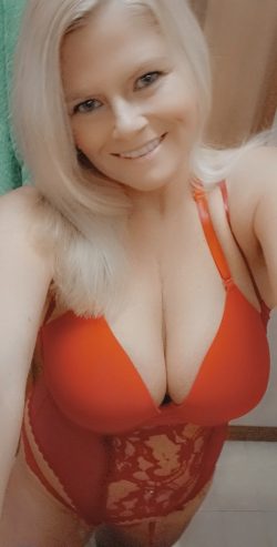 Blonde milf seduces you with cleavage