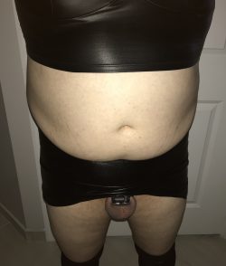 All black leather with a black micro chastity cage. Cucky is matching!