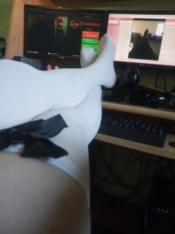 white stockings with black ribbon and black heels