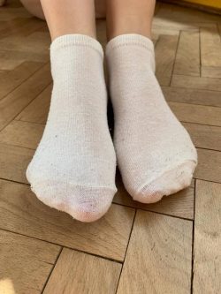 Sweaty pale pink ankle socks to sniff