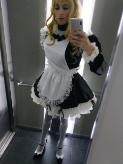 Sissy maid Marga in public elevator