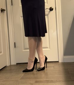 Pink Nylons and heels with black skirt